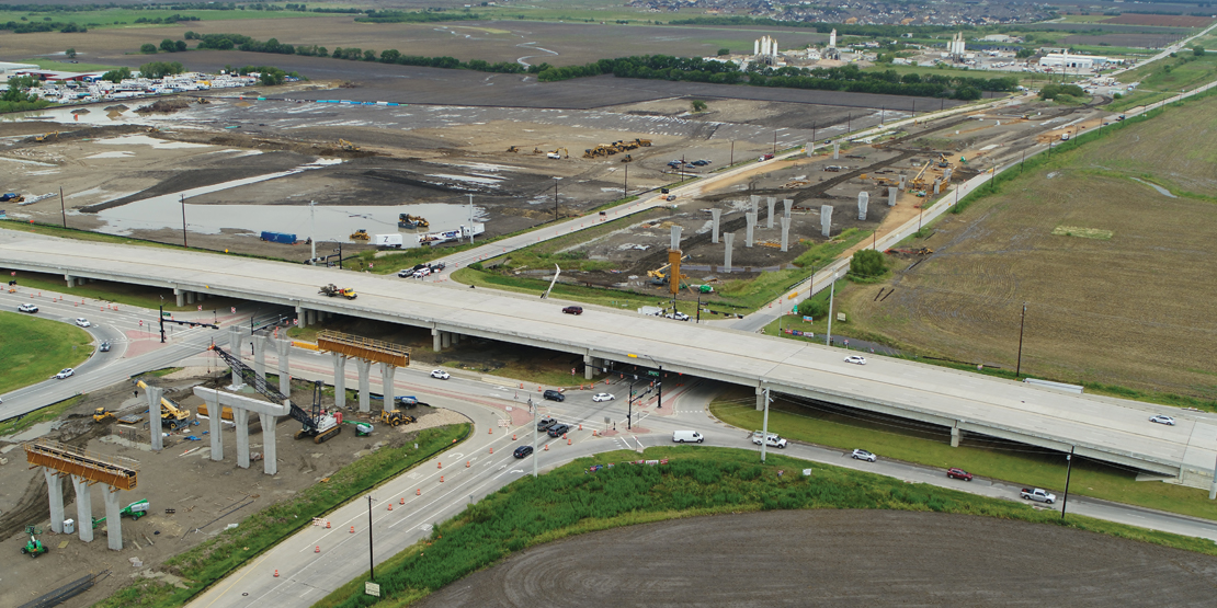 An aerial view of the support columns being built for the North Tollway Phase 4A extention designed by BGE, Inc.