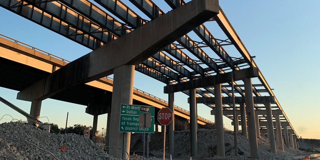 Underside of the IH-35 Waco 4B highway under construction at dusk