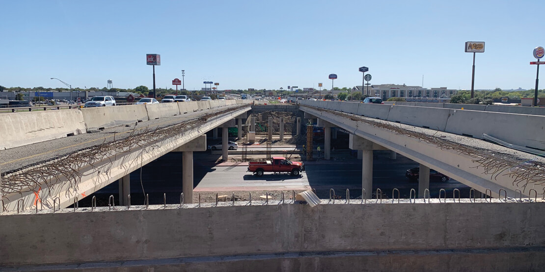 A close up of a new center lain bridge being constructed for the IH 35 Waco 4B freeway