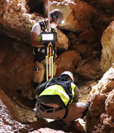 A BGE survey team working in a cave