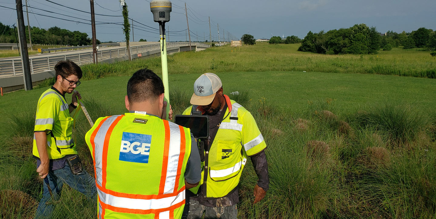 A BGE survey team working in a field