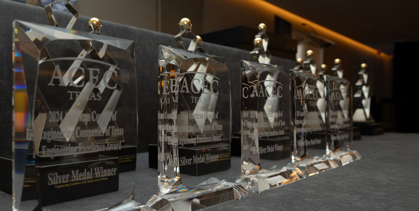 A row of awards on a table