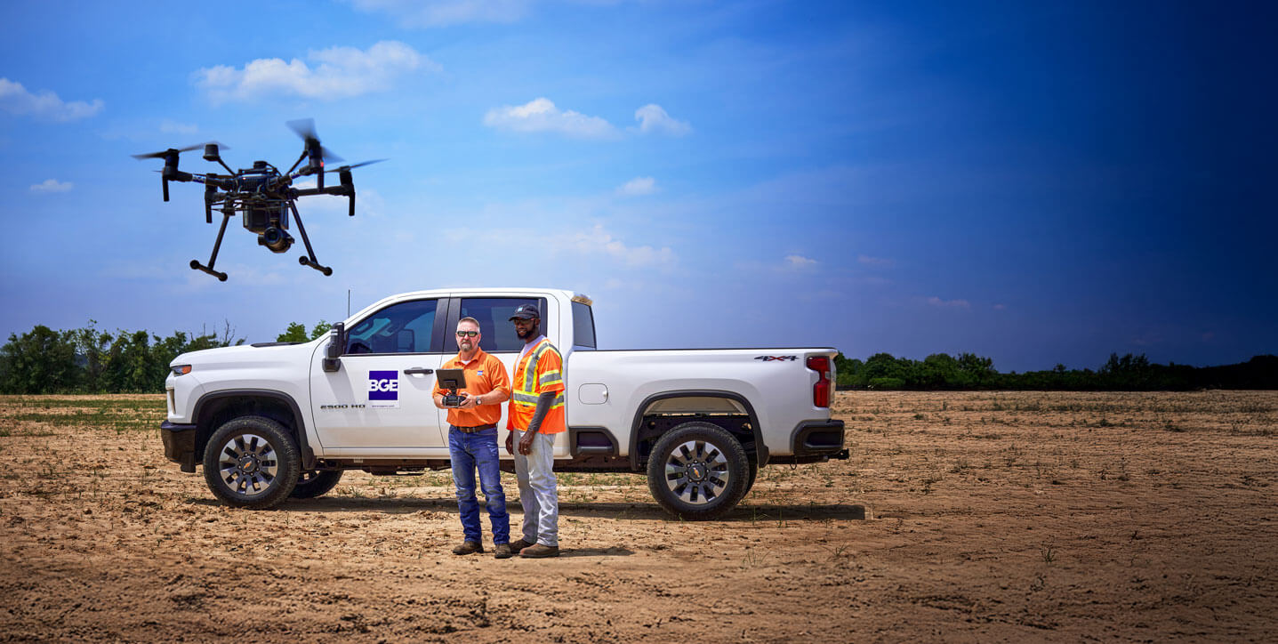 A BGE team in the field using a drone to help survey