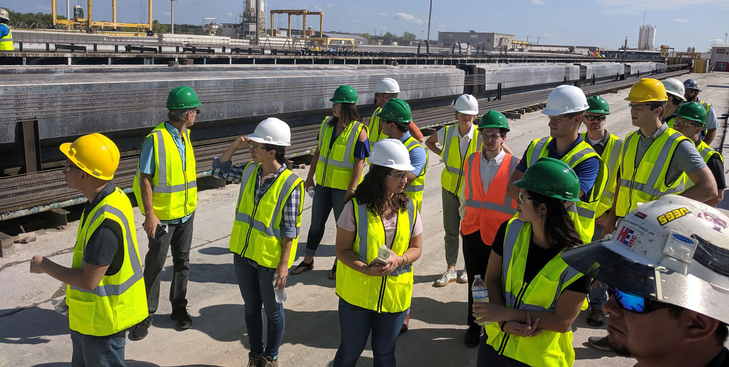 College recruits standing together at a BGE construction site